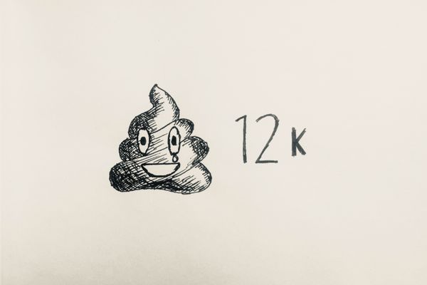 Ink drawing of a poo emoji with 12 thousand clicks